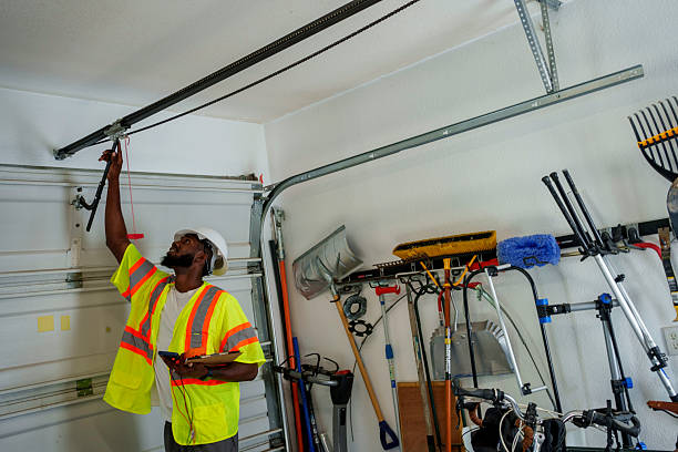 Professional Garage Door Panel Replacement technician working in Baywood, NY